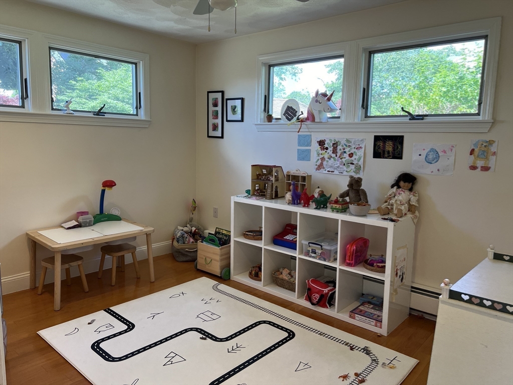 11 Garrison Road, Unit 1 Arlington, MA 02474 - Photo 31 of 42 a room with furniture and a window