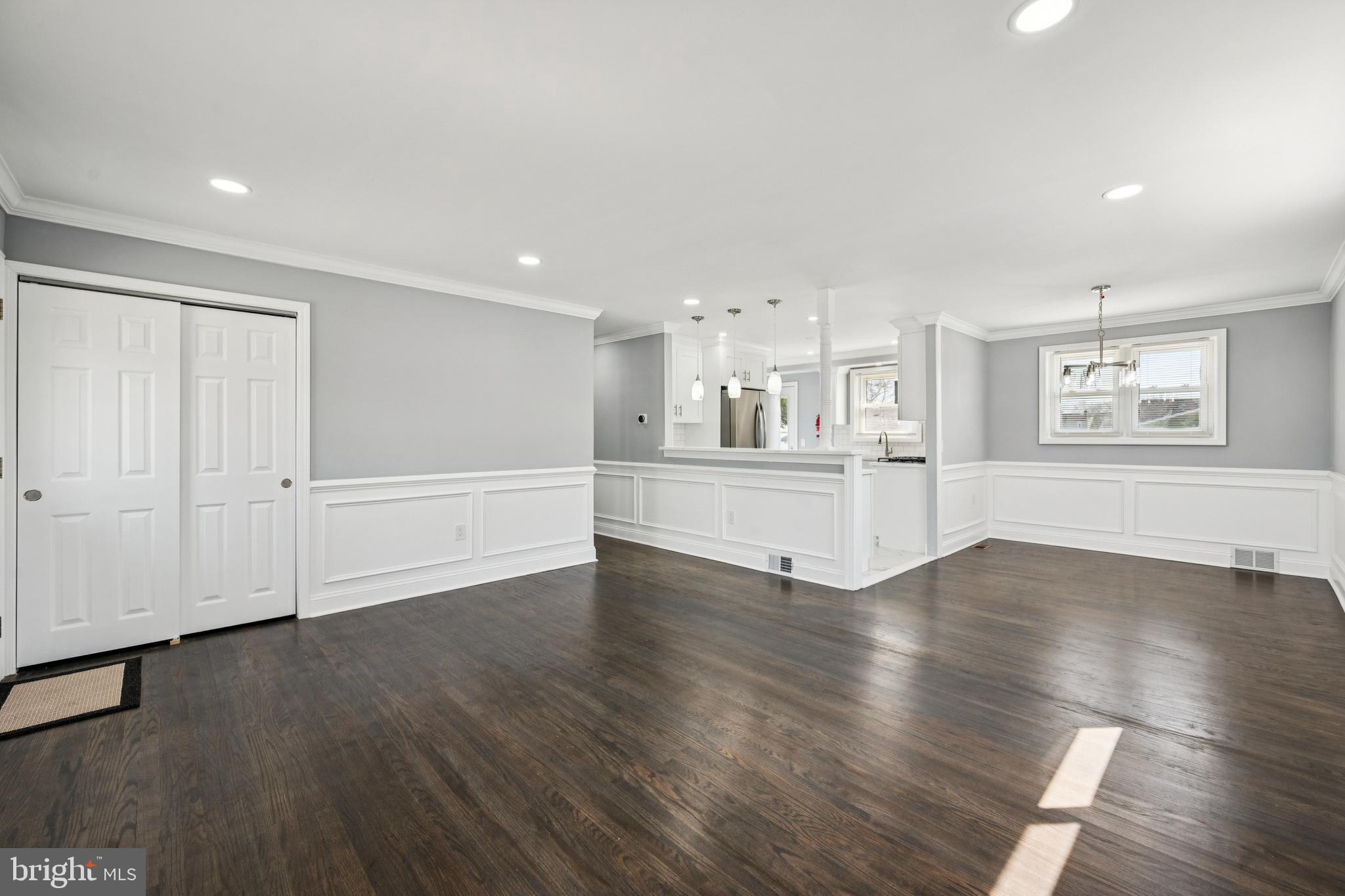 500 West Charles Street Palmyra, NJ 08065 - Photo 12 of 26 a view of a kitchen with wooden floor and windows
