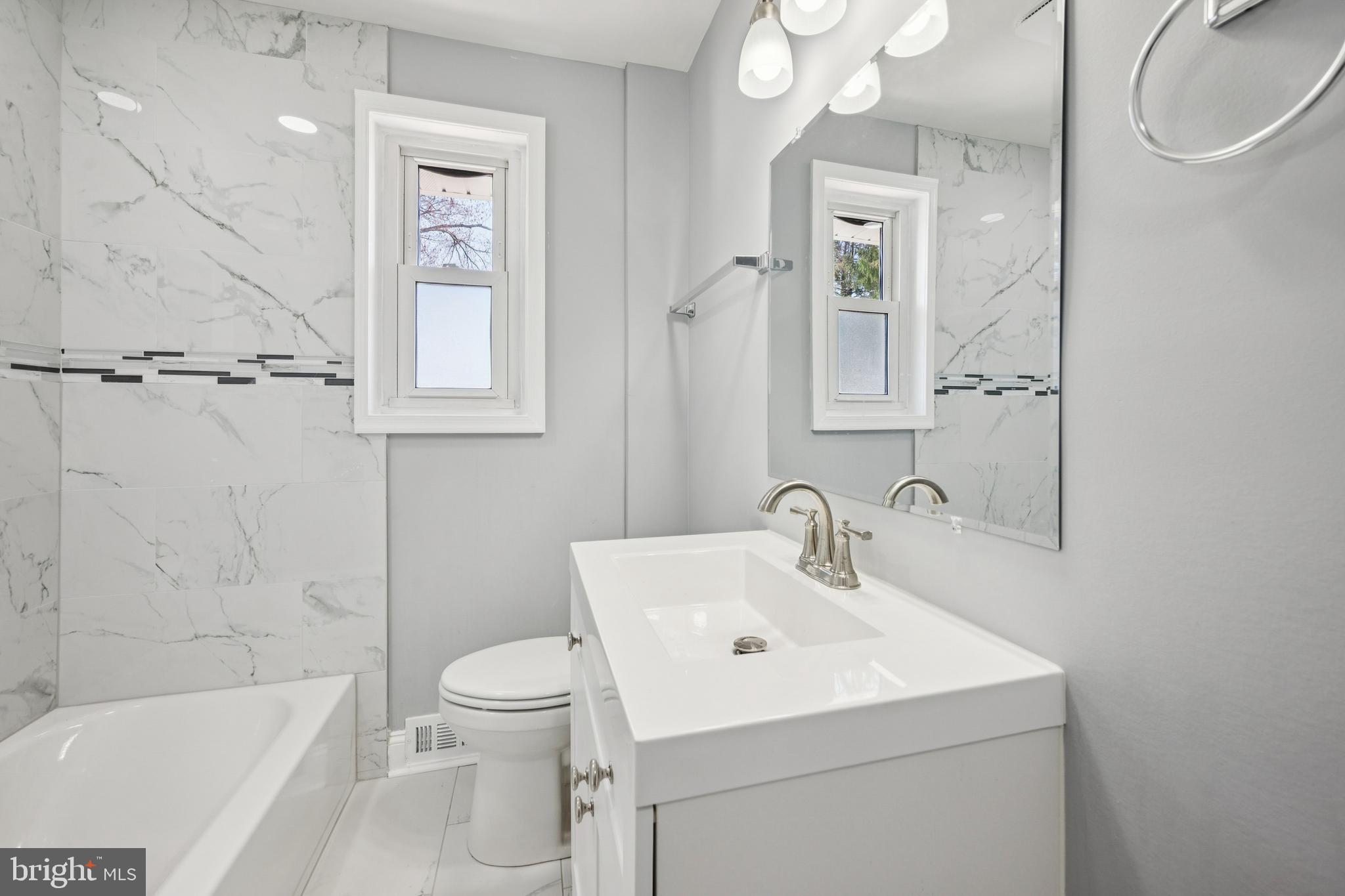 500 West Charles Street Palmyra, NJ 08065 - Photo 17 of 26 a bathroom with a sink toilet and shower