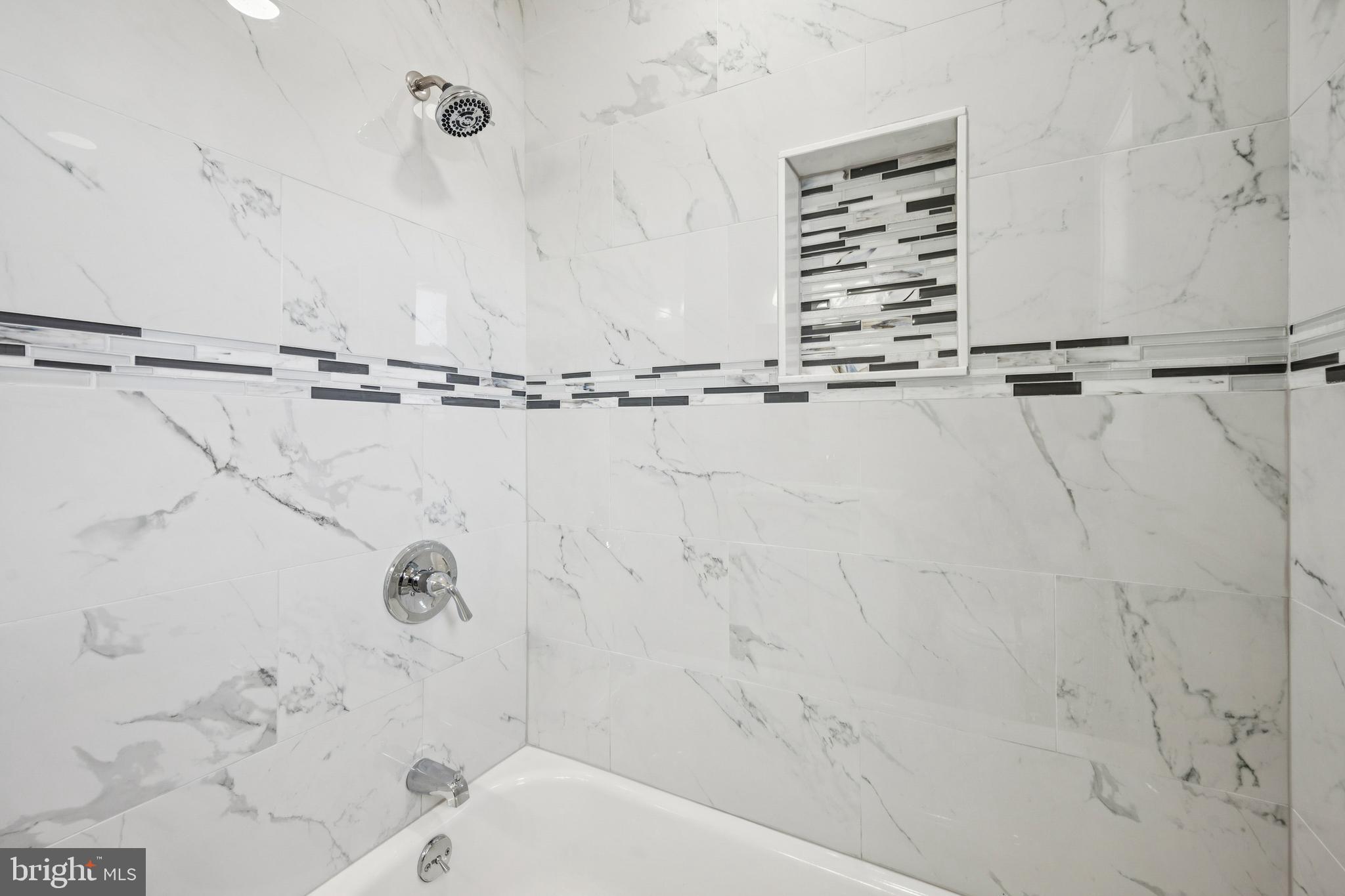 500 West Charles Street Palmyra, NJ 08065 - Photo 18 of 26 a bathroom with a shower and a bathtub