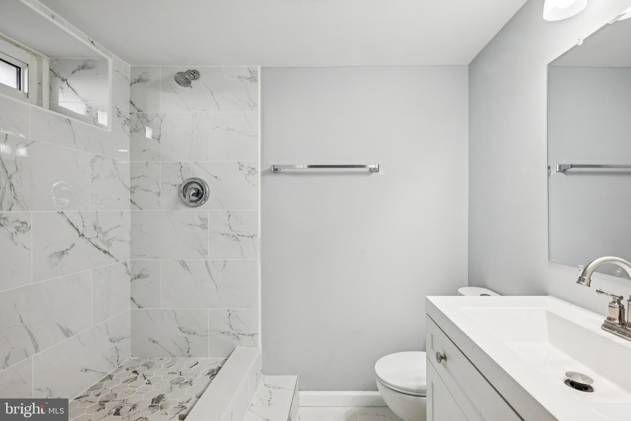 500 West Charles Street Palmyra, NJ 08065 - Photo 22 of 26 a bathroom with a sink toilet and shower