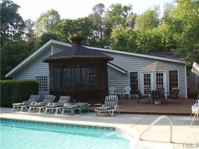 2565 Fairground Road Benson, NC 27504 - Photo 1 of 22 a view of house with yard outdoor seating and green space