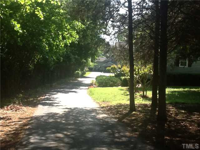 2565 Fairground Road Benson, NC 27504 - Photo 14 of 22 a view of a yard with trees