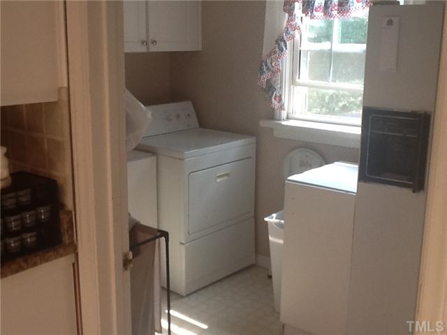 2565 Fairground Road Benson, NC 27504 - Photo 15 of 22 a utility room with closet dryer and washer