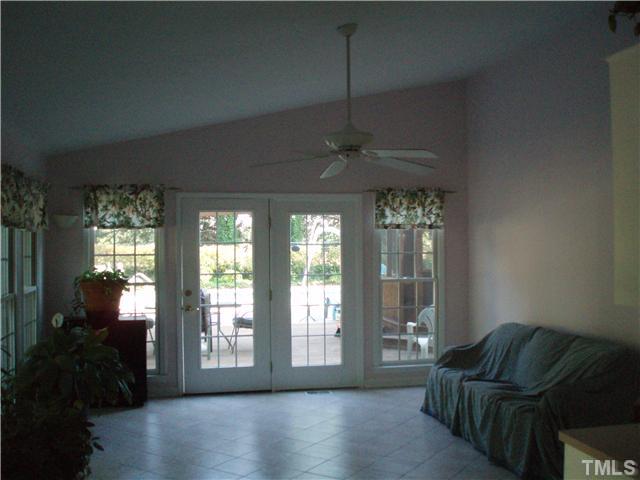 2565 Fairground Road Benson, NC 27504 - Photo 9 of 22 a living room with furniture and a flat screen tv