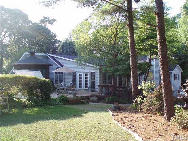 2565 Fairground Road Benson, NC 27504 - Photo 10 of 22 a front view of a house with garden