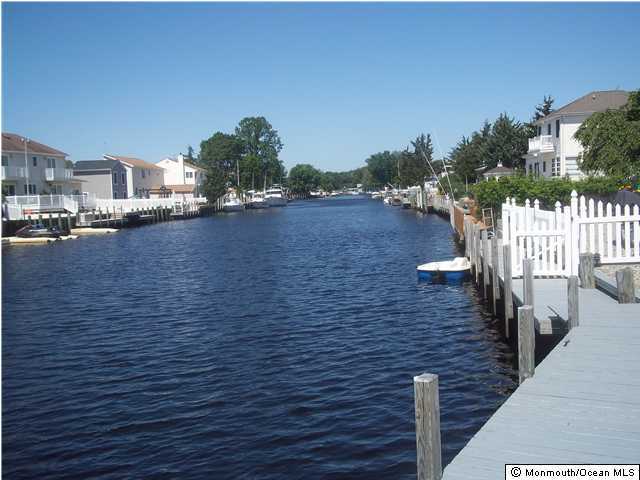 96 Cedar Run Road Bayville, NJ 08721 - Photo 3 of 3 a view of a city from a balcony