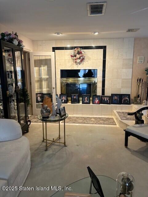 1061 Woodhull Avenue Staten Island, NY 10312 - Photo 3 of 8 a living room with furniture and a flat screen tv