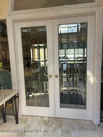 a view of living room and dining room view