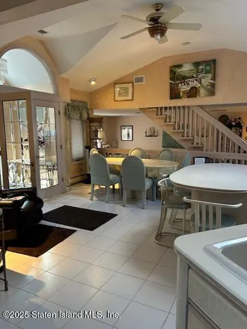 a dinning table and chairs in a room