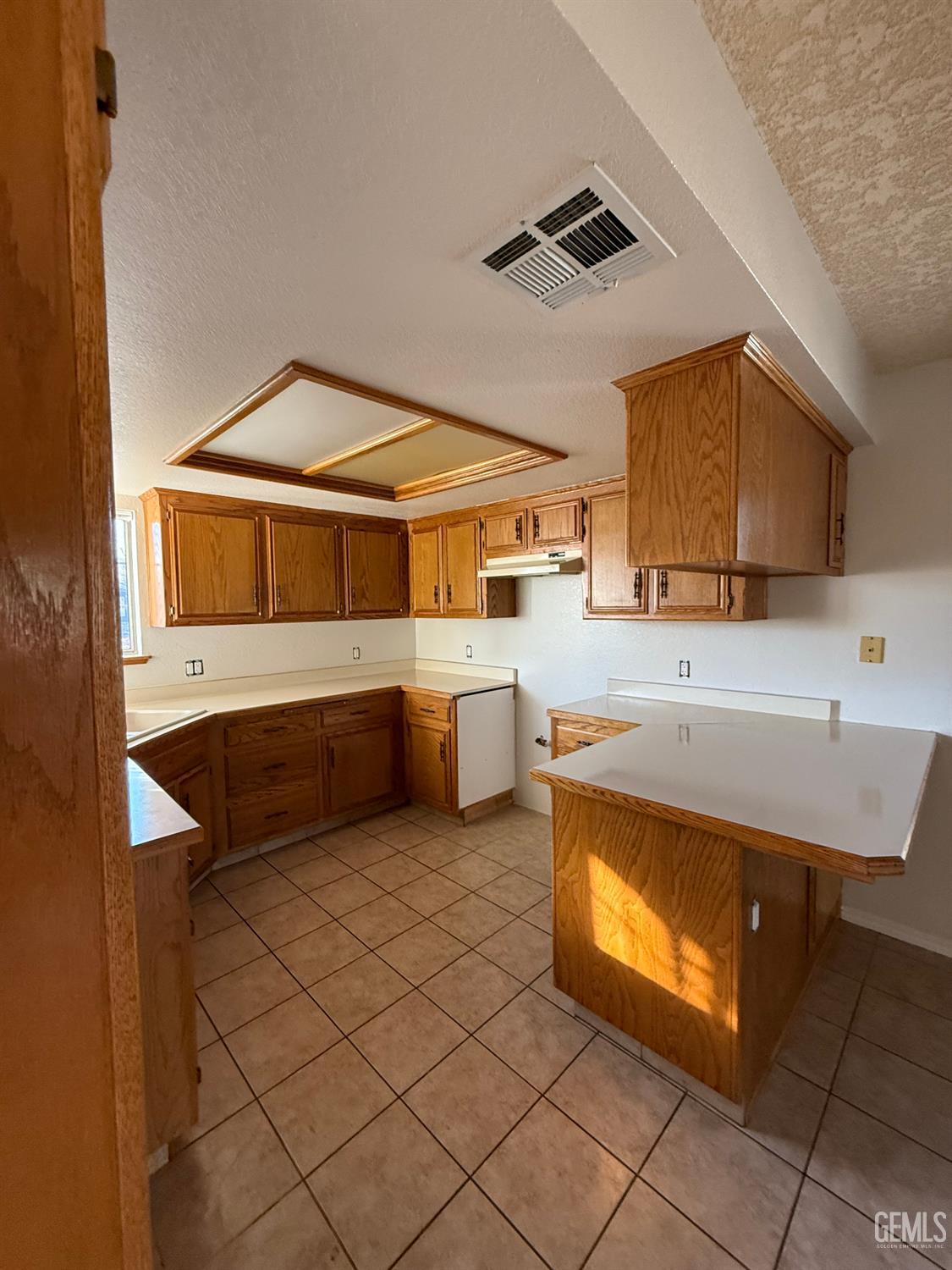 Undisclosed Address Tehachapi, CA 93561 - Photo 3 of 7 a kitchen with stainless steel appliances a sink and a stove