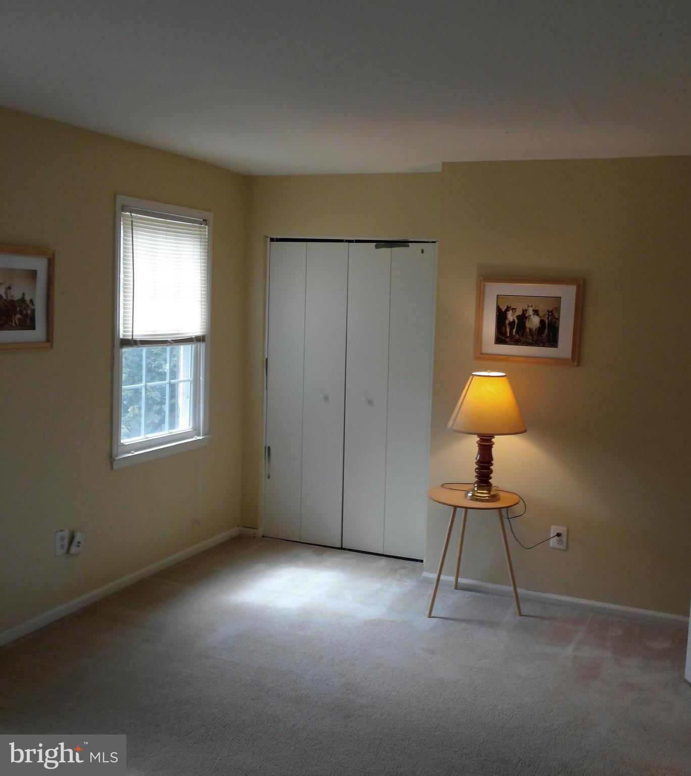 14591 Golden Oak Road Centreville, VA 20121 - Photo 16 of 21 a view of a room with a lounge chair and a window
