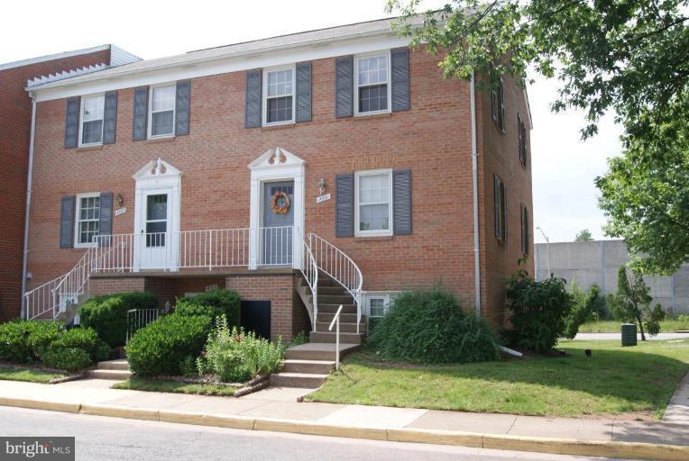 14591 Golden Oak Road Centreville, VA 20121 - Photo 3 of 21 a front view of a house with a yard