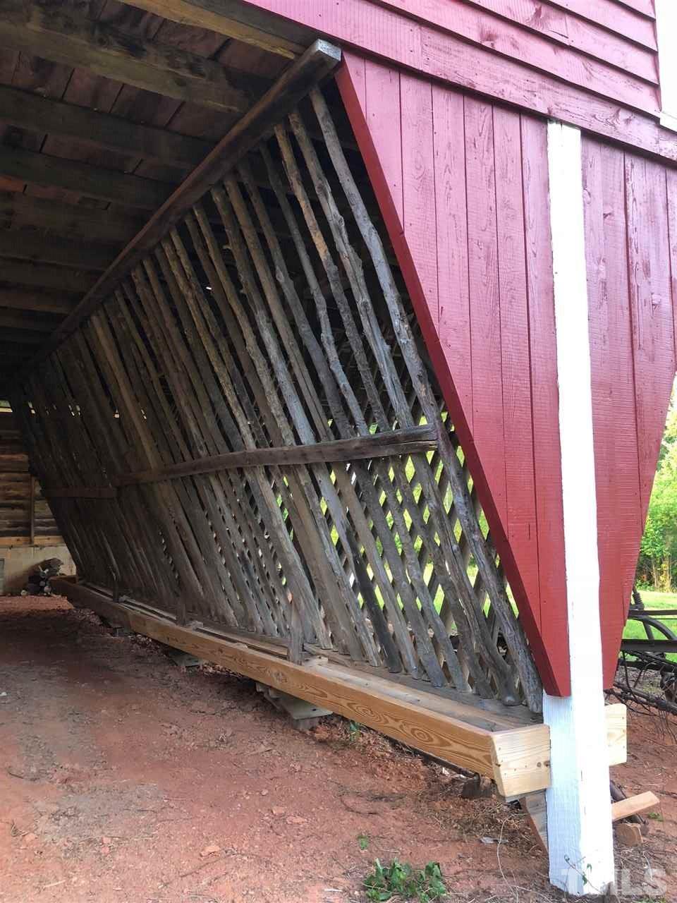 224 Roy Pierce Road Timberlake, NC 27583 - Photo 11 of 23 This old hay rack was constructed for feeding cattle.