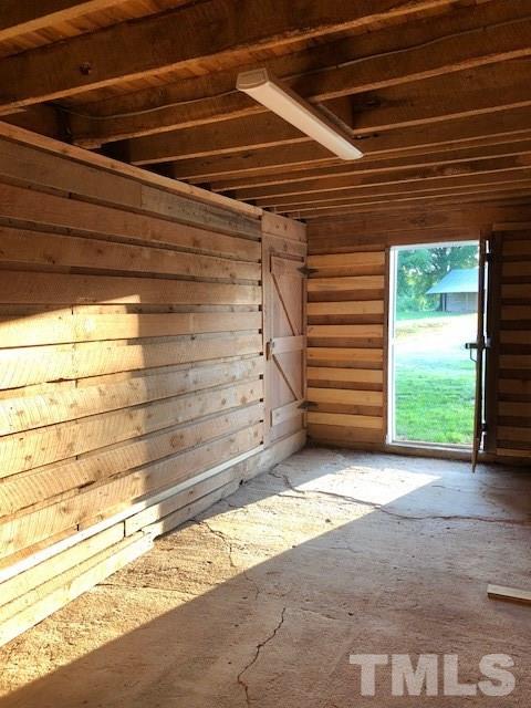 224 Roy Pierce Road Timberlake, NC 27583 - Photo 16 of 23 This is an old corn crib that was closed in. Having so much space (22x9) there could be lots of uses for it. My first thought was a tack room.