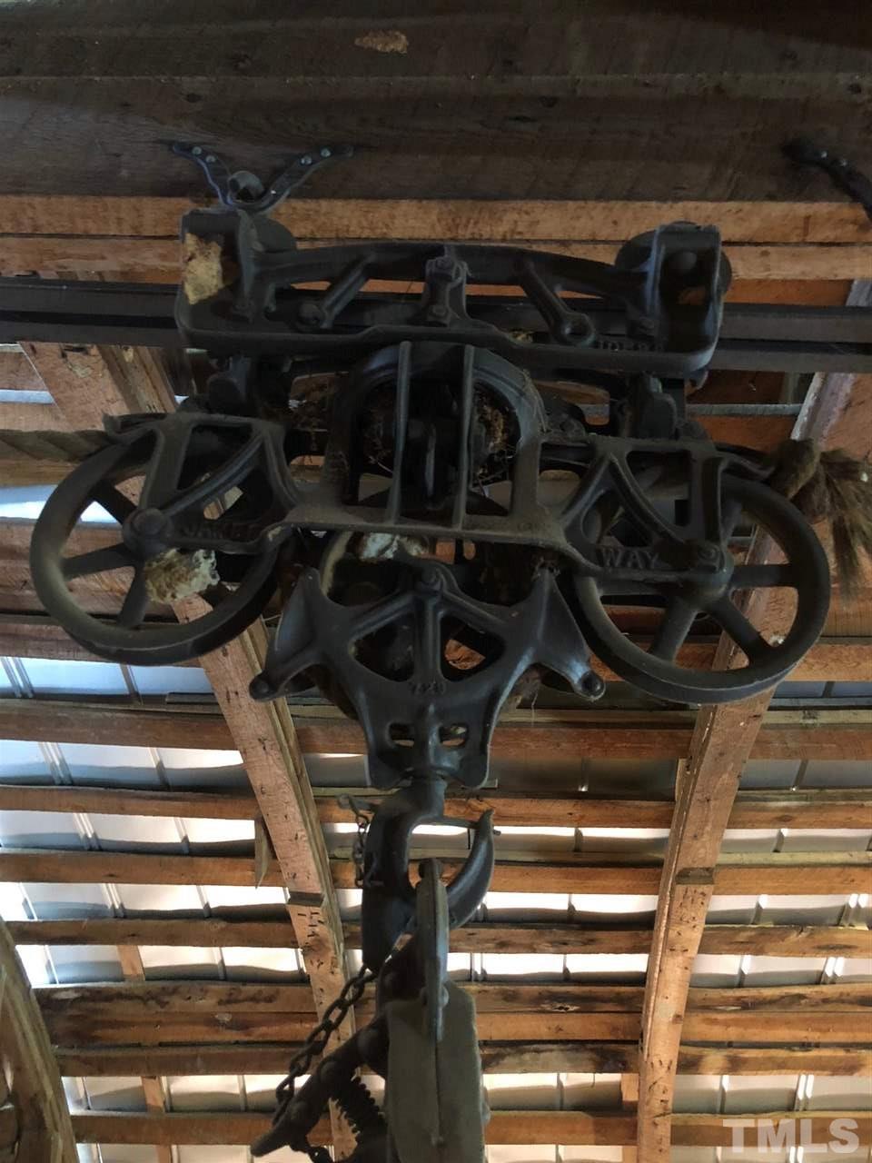 224 Roy Pierce Road Timberlake, NC 27583 - Photo 20 of 23 Hand wrought iron, the mechanics of this intricate trolley are fascinating. This piece of equipment dates back to the early 1900's.