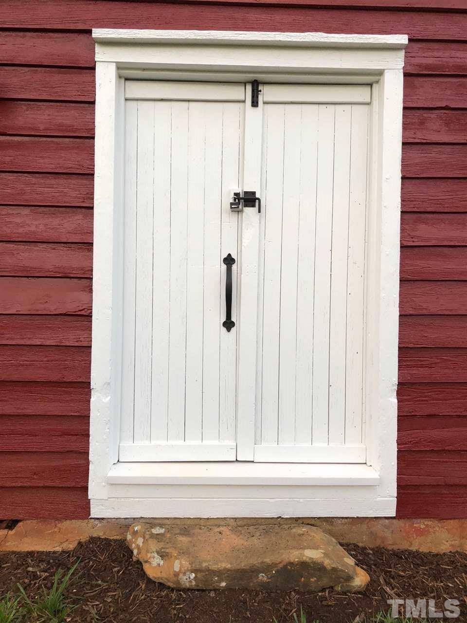 224 Roy Pierce Road Timberlake, NC 27583 - Photo 5 of 23 These doors open onto an elevated hallway.