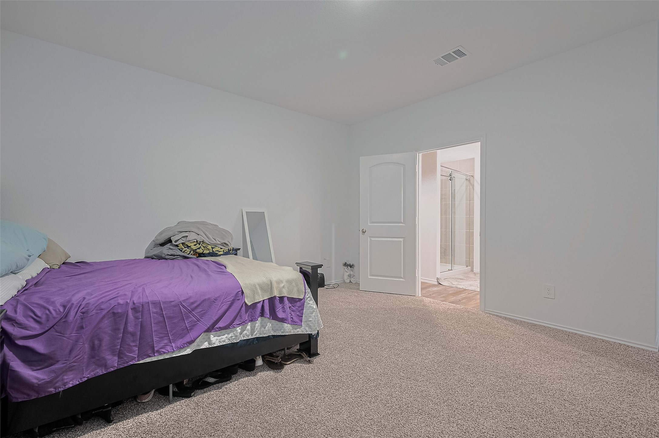40434 Basalt Elm Road Magnolia, TX 77354 - Photo 20 of 41 a bedroom with a bed and a window