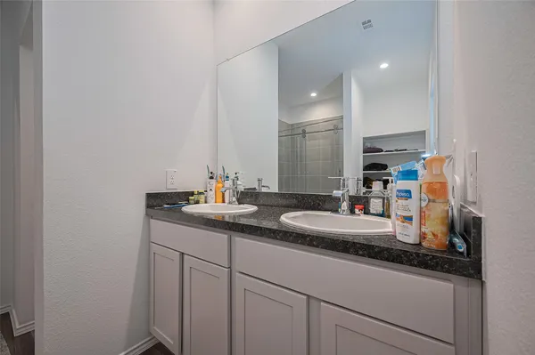 a bathroom with a shower curtain