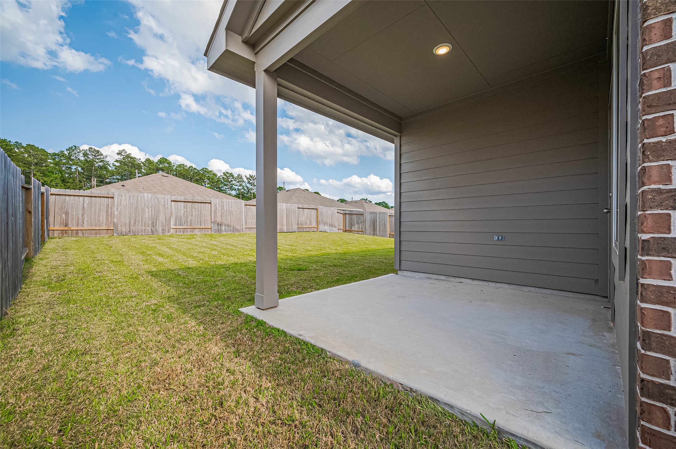 40434 Basalt Elm Road Magnolia, TX 77354 - Photo 34 of 41 a view of a porch with a big yard