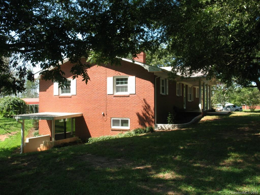 2595 Deal Road Mooresville, NC 28115 - Photo 15 of 19 a front view of a house with a yard
