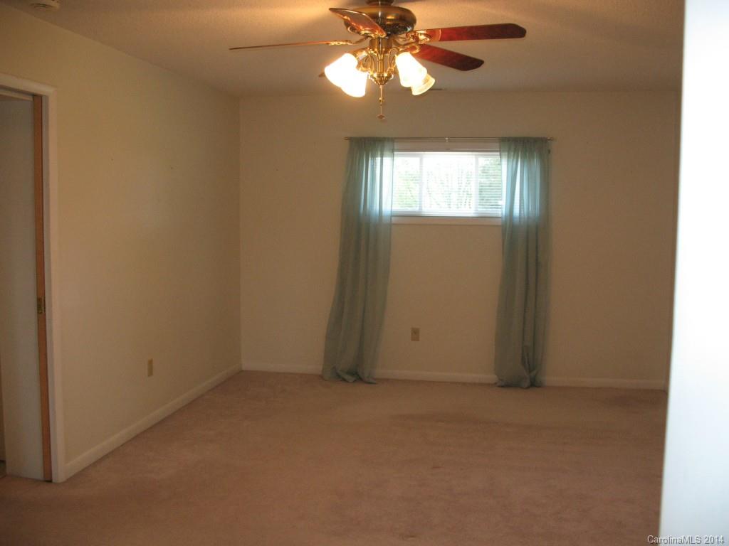 2595 Deal Road Mooresville, NC 28115 - Photo 7 of 19 a view of an empty room with window