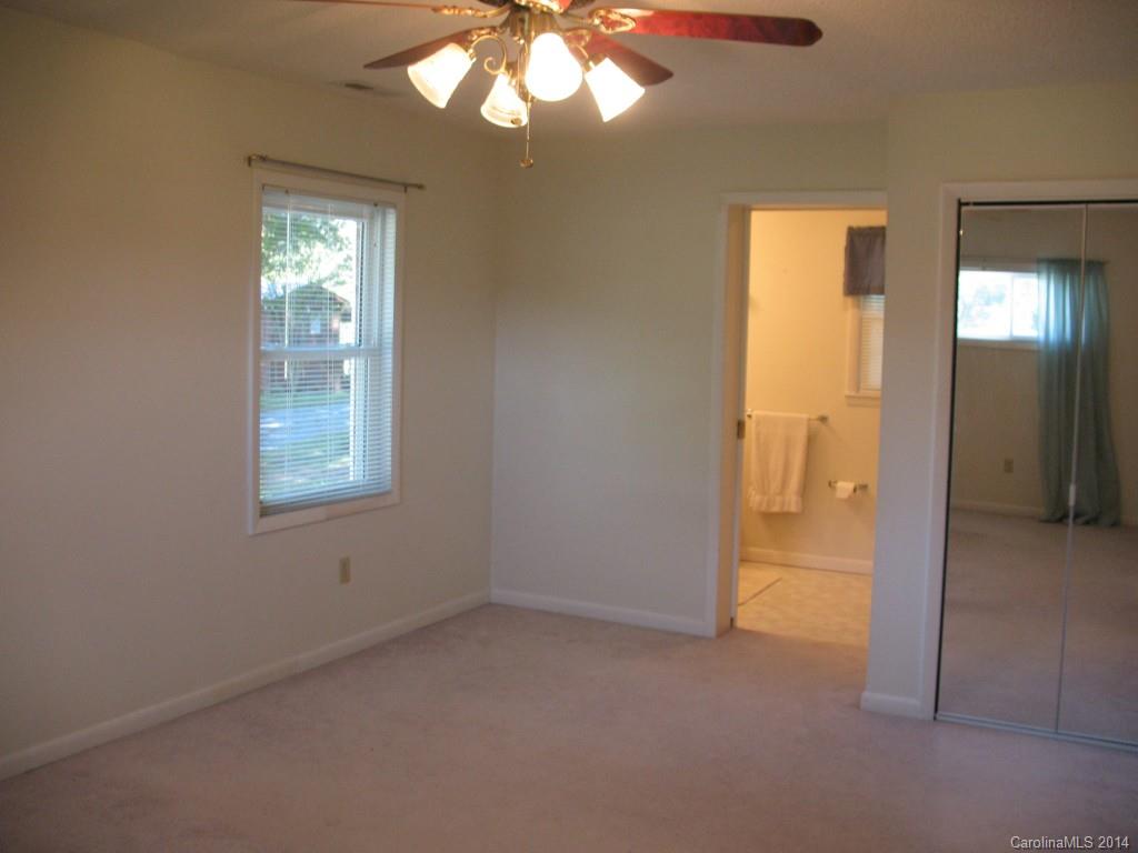 2595 Deal Road Mooresville, NC 28115 - Photo 8 of 19 an empty room that has a window