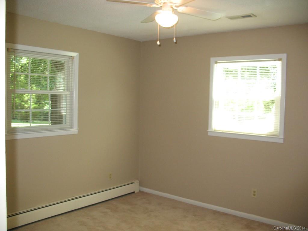 2595 Deal Road Mooresville, NC 28115 - Photo 10 of 19 an empty room with a window