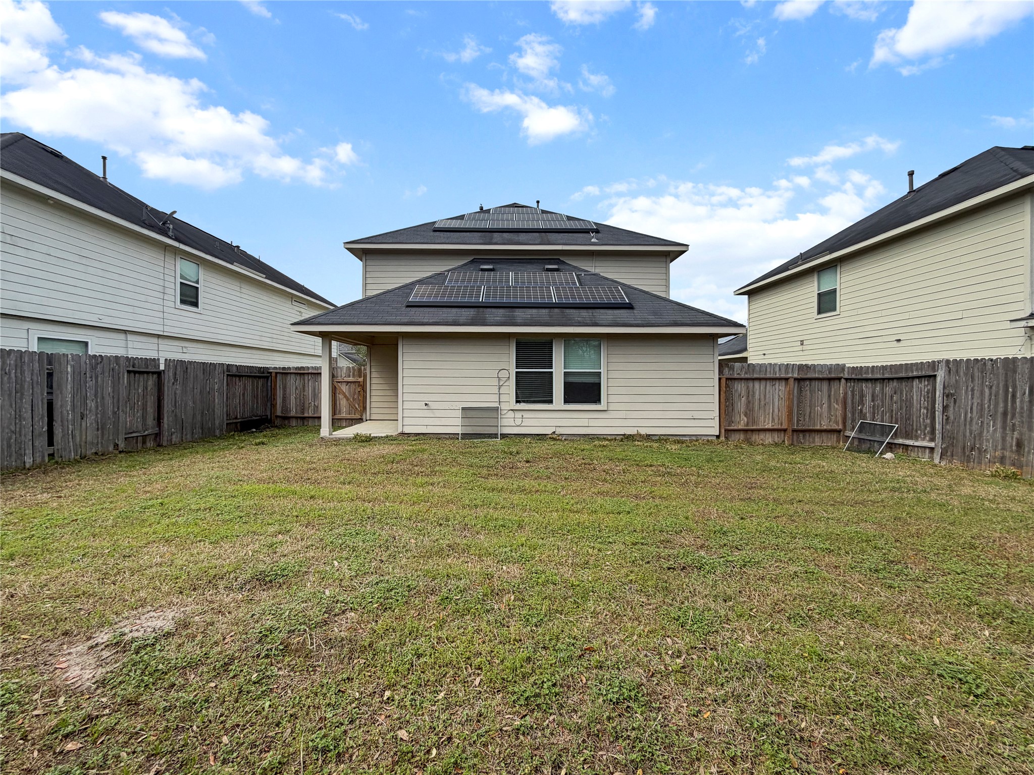 3542 Maris Way Humble, TX 77338 - Photo 21 of 21 a front view of a house with a garden and yard