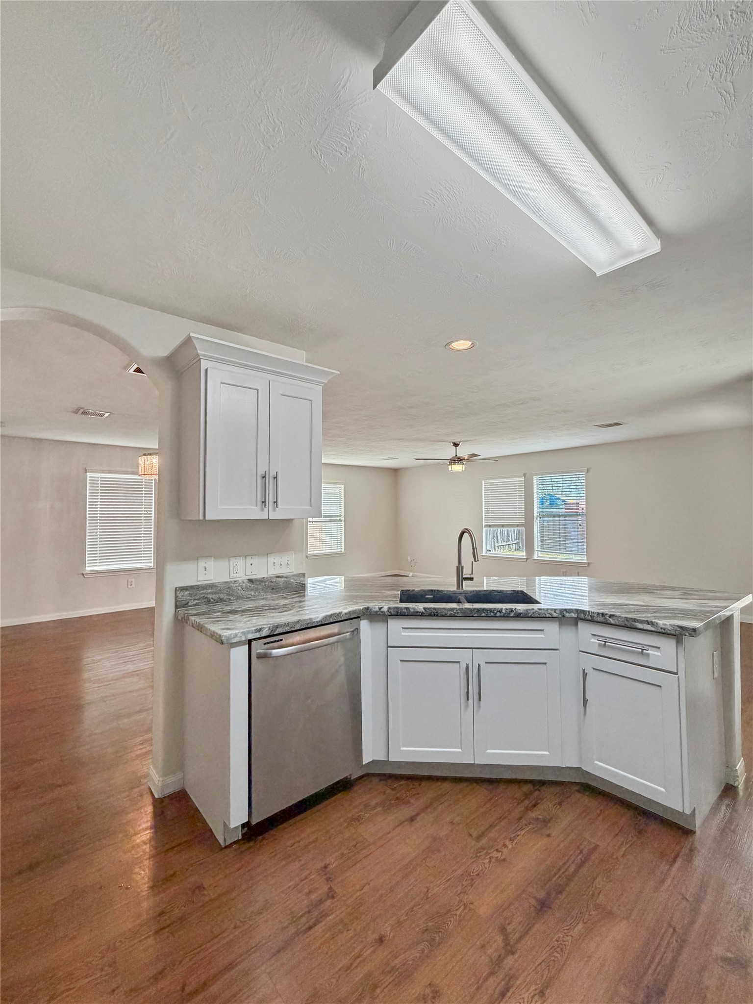 3542 Maris Way Humble, TX 77338 - Photo 6 of 21 a kitchen with stainless steel appliances granite countertop a sink and cabinets