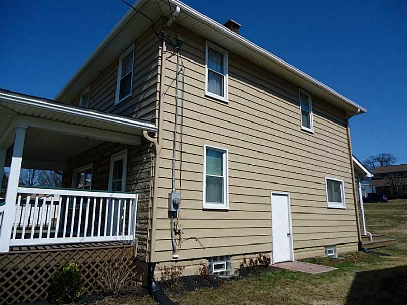 1408 Darlington Road Beaver Falls, PA 15010 - Photo 23 of 24 Exterior Front. Side door to basement for convenience.