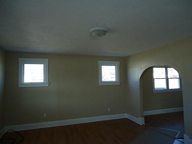 1408 Darlington Road Beaver Falls, PA 15010 - Photo 6 of 24 Living Room. Lots of light and archway to dining room.