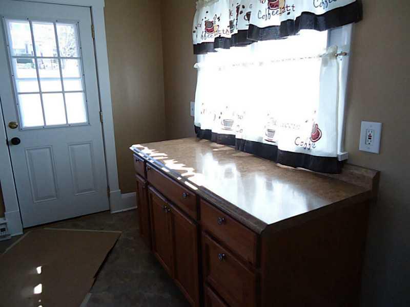 1408 Darlington Road Beaver Falls, PA 15010 - Photo 10 of 24 Kitchen. Pretty cabinets and counter tops.