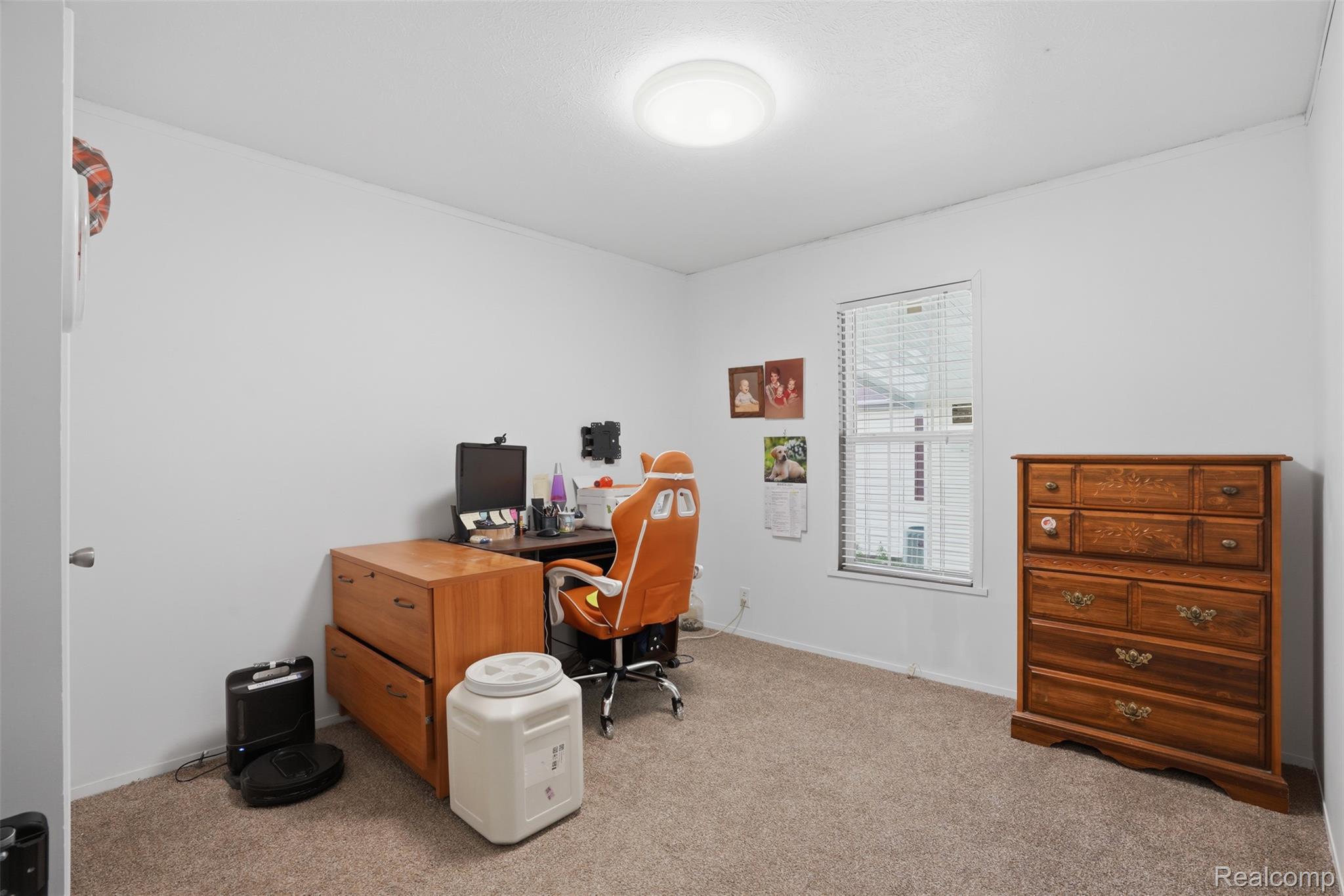 150 Whippoorwill Lane Rochester, MI 48309 - Photo 15 of 28 Carpeted room with a single window featuring horizontal blinds
