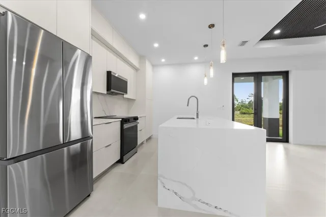 $319,800 | 729 Colyer Street East, Lehigh Acres, FL 33974