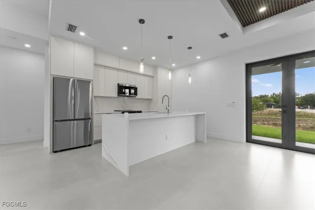 $319,800 | 729 Colyer Street East, Lehigh Acres, FL 33974