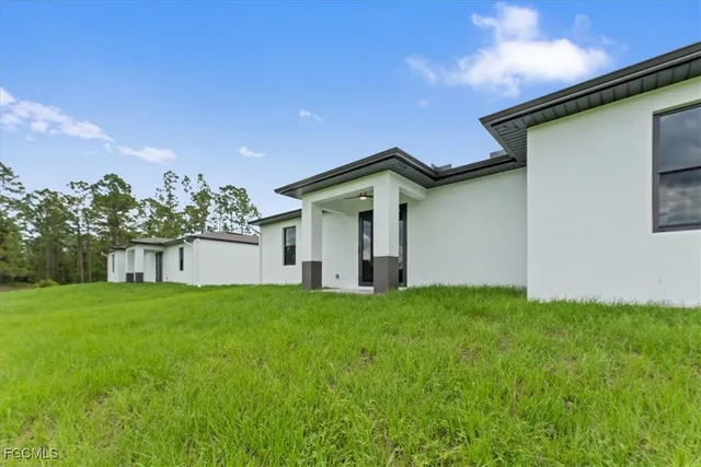 $319,800 | 729 Colyer Street East, Lehigh Acres, FL 33974