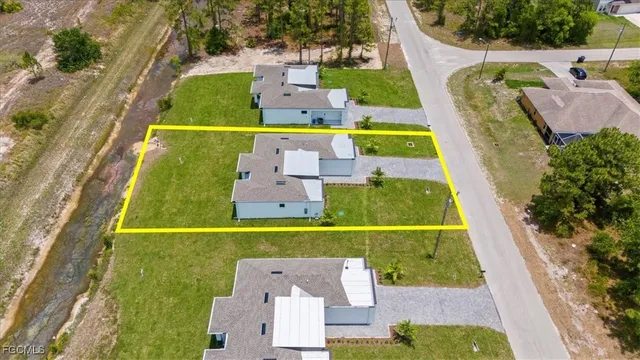 $319,800 | 729 Colyer Street East, Lehigh Acres, FL 33974