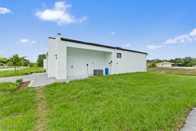 $319,800 | 729 Colyer Street East, Lehigh Acres, FL 33974