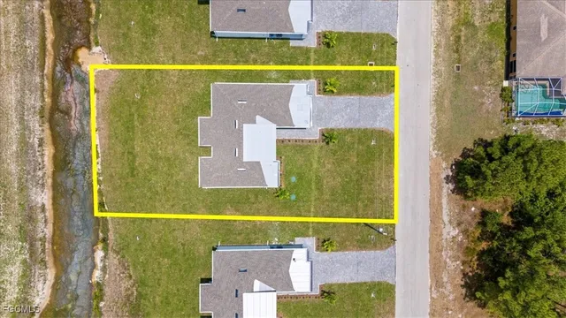 $319,800 | 729 Colyer Street East, Lehigh Acres, FL 33974