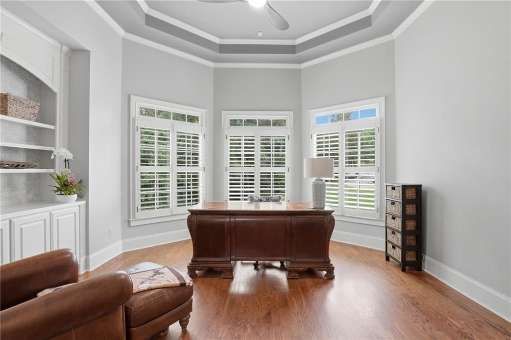 2950 Callie Still Road Lawrenceville, GA 30045 - Photo 25 of 77 a view of a livingroom with workspace and a window