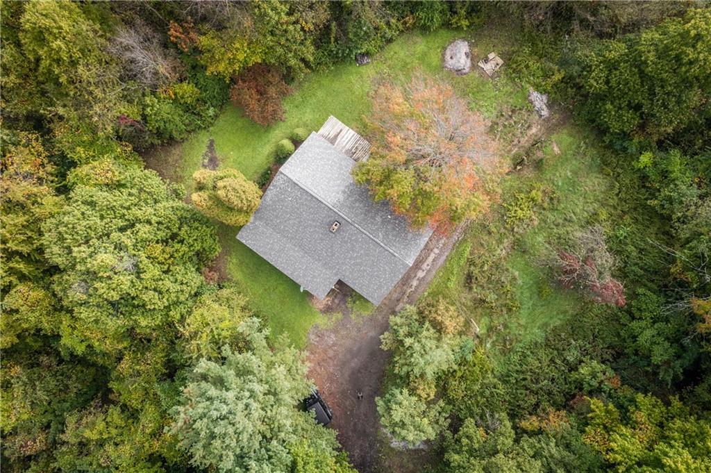 103 Guillard Road Prospect, PA 16052 - Photo 24 of 25 an aerial view of a house with a yard and lake view