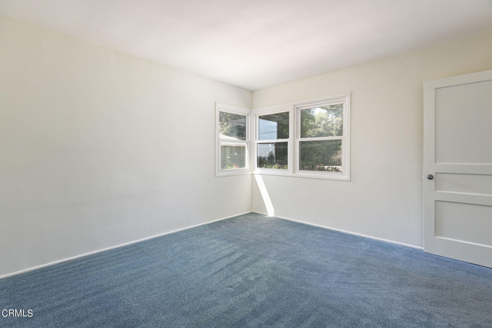 3565 McNally Avenue Altadena, CA 91001 - Photo 13 of 33 wooden floor in an empty room with a window