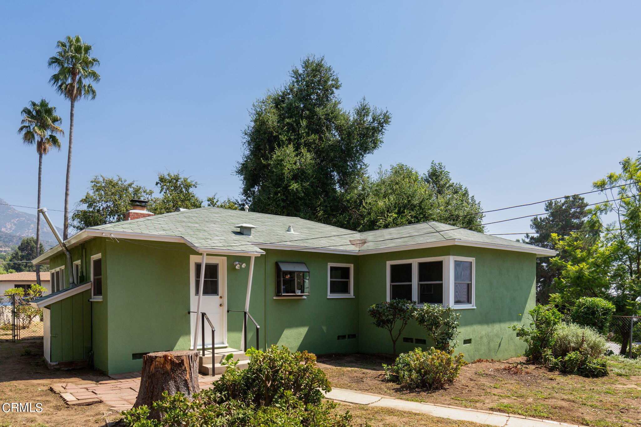3565 McNally Avenue Altadena, CA 91001 - Photo 18 of 33 a front view of a house with a garden