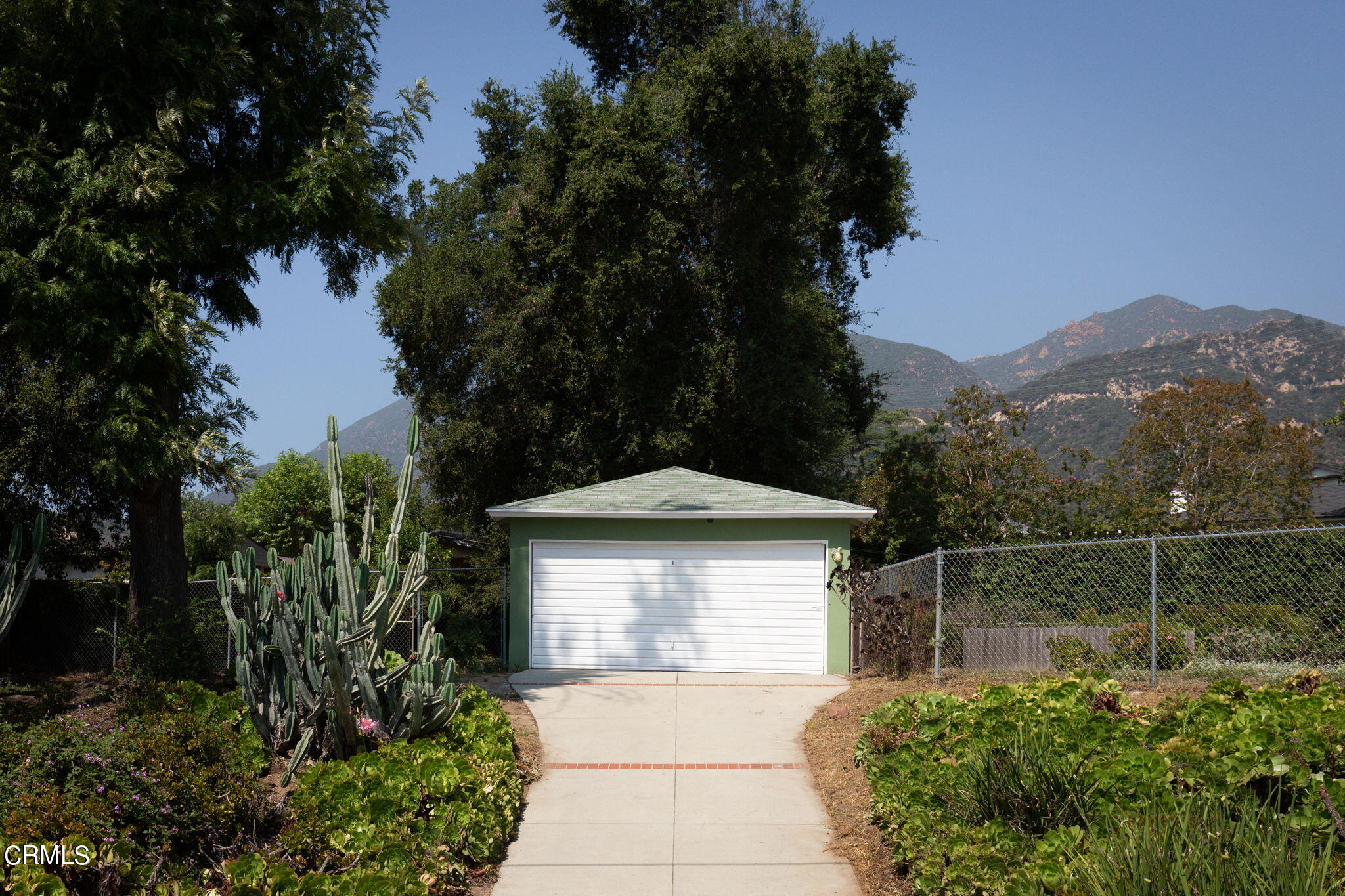 3565 McNally Avenue Altadena, CA 91001 - Photo 24 of 33 a front view of a house with a yard and garage