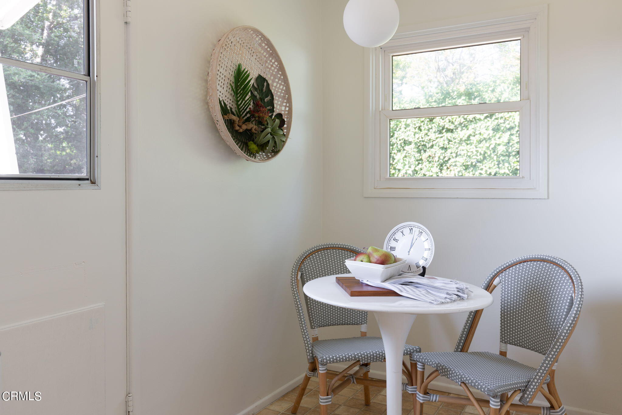 3565 McNally Avenue Altadena, CA 91001 - Photo 10 of 33 a view of a dining room with a table and chairs