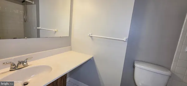 a bathroom with a sink and a vanity