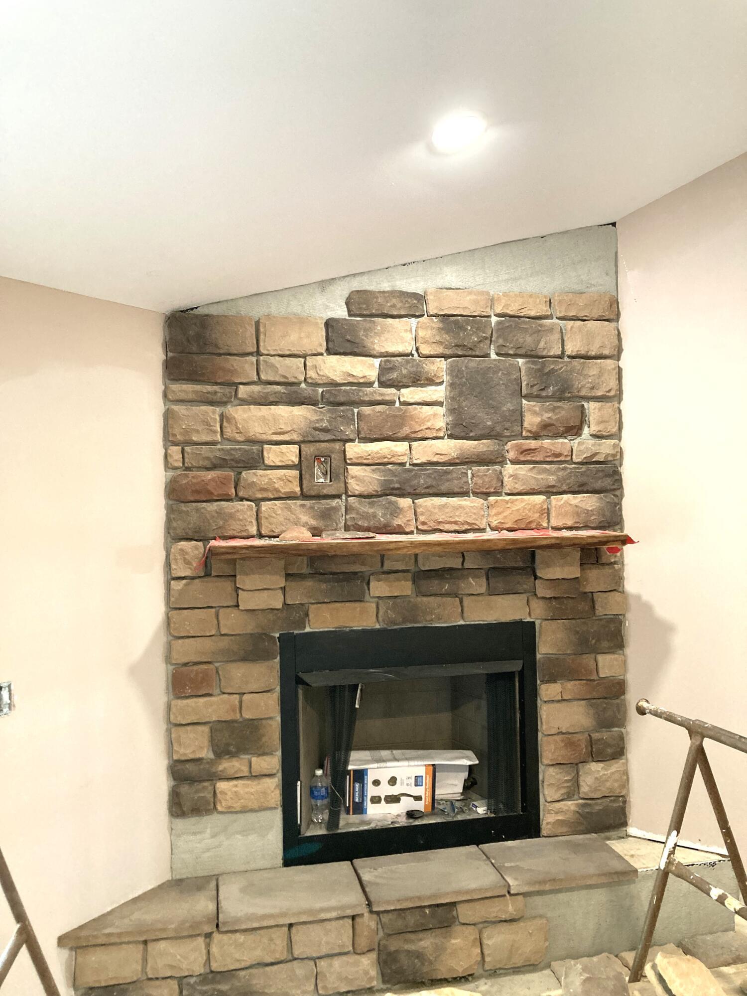 15571 Fairgrounds Road Centerburg, OH 43011 - Photo 4 of 6 Fireplace has stone surround and wood mantle