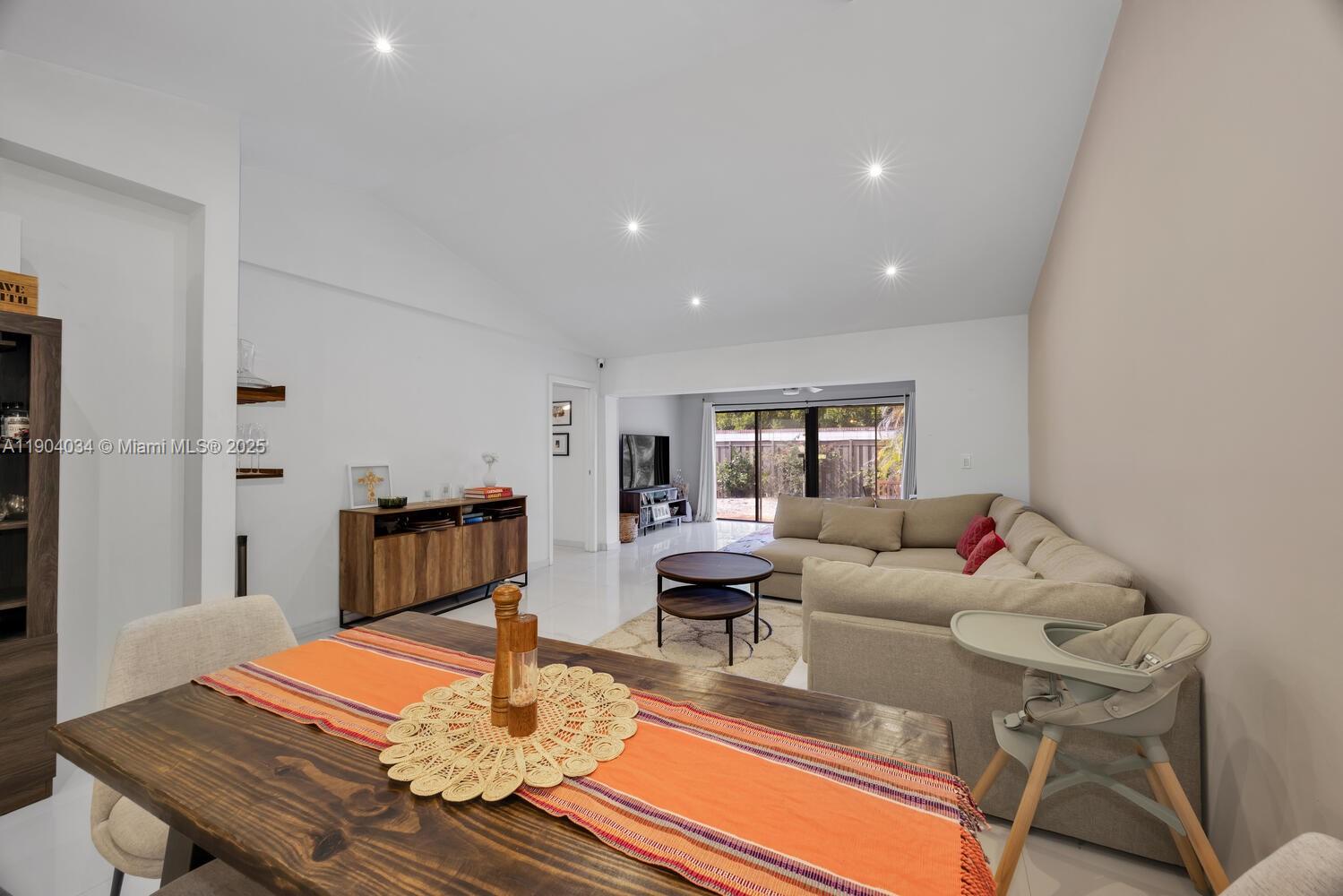 8596 Southwest 115th Place Miami, FL 33173 - Photo 12 of 39 a living room with furniture