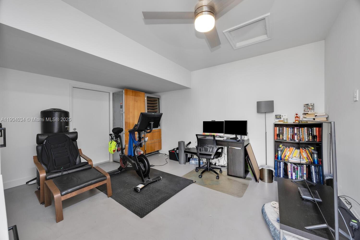 8596 Southwest 115th Place Miami, FL 33173 - Photo 29 of 39 a view of a room with gym equipment